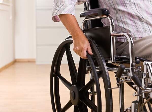 Senior Woman Sitting In Wheelchair